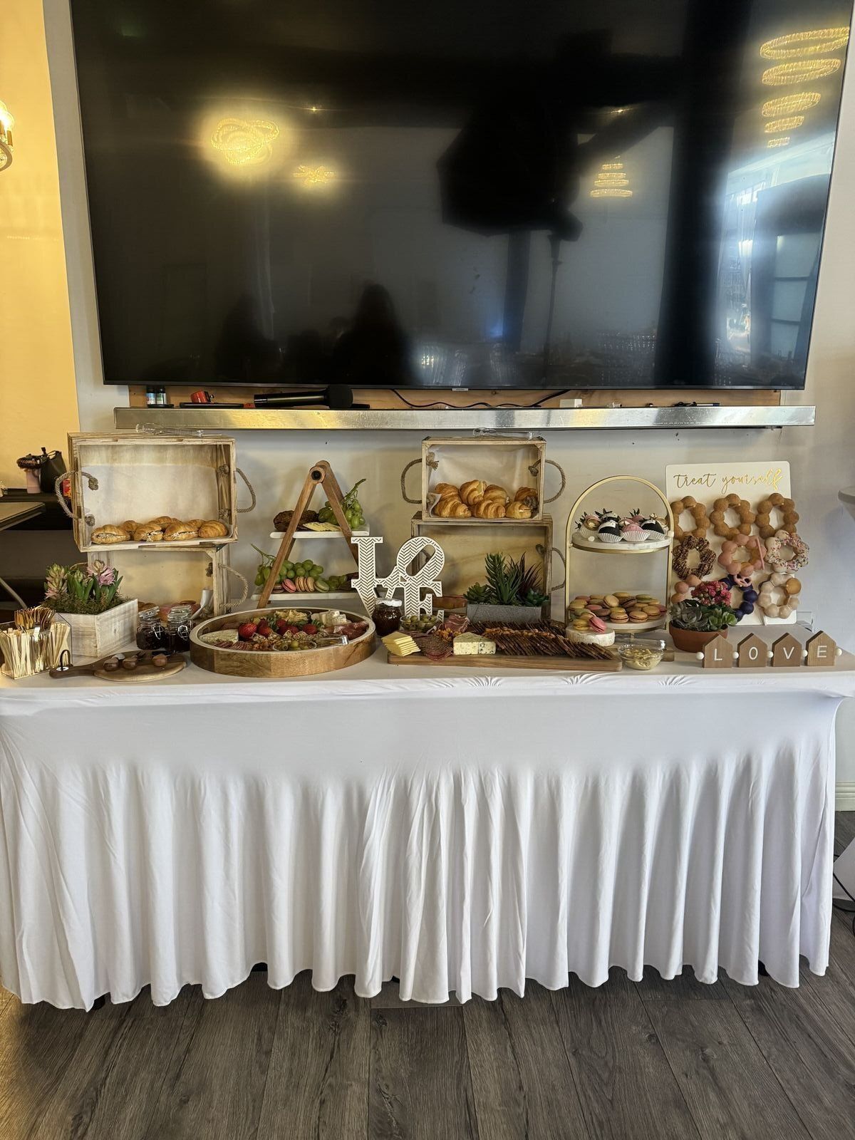 Elegant food and dessert display setup at The Prestige Venue