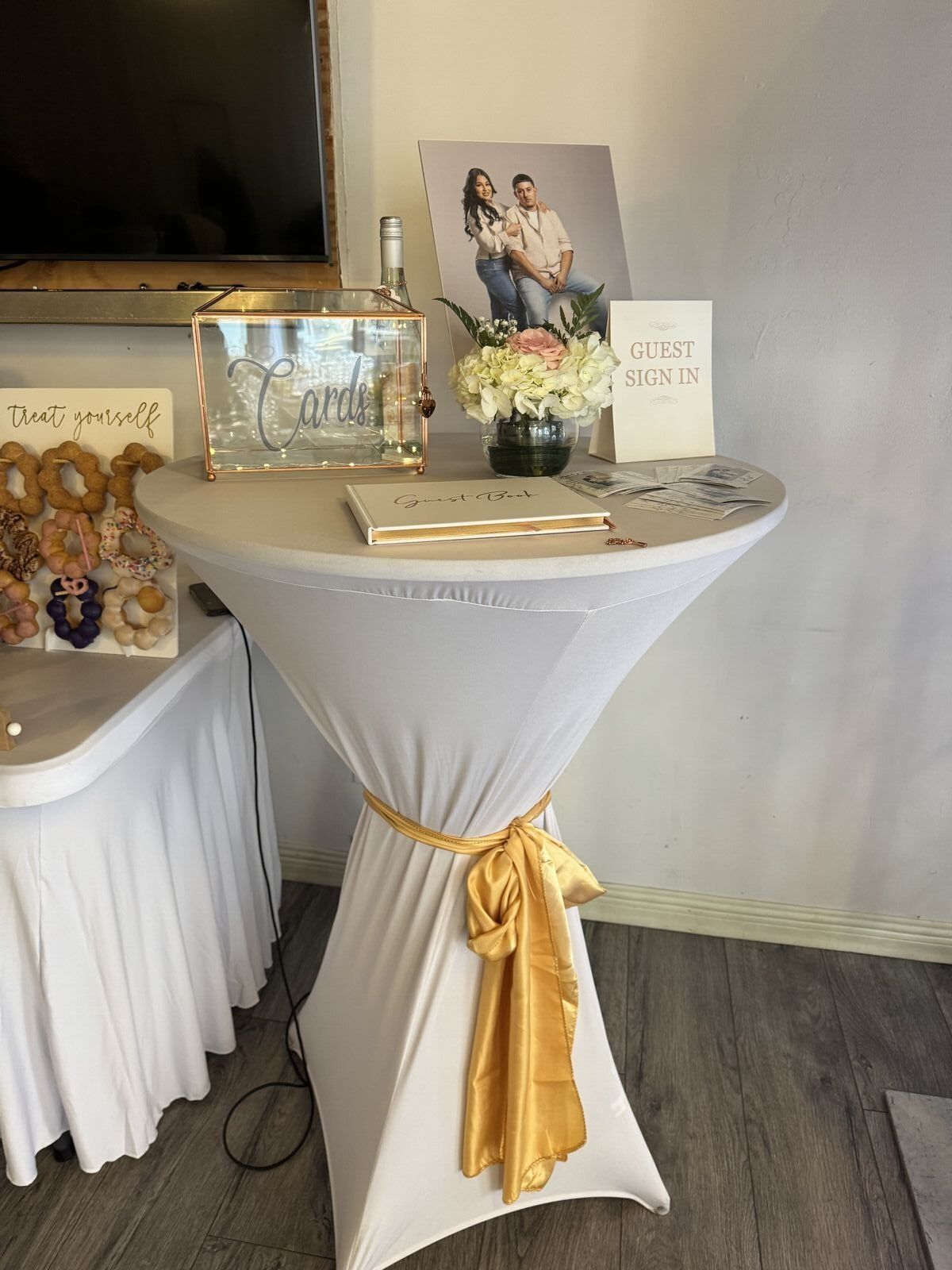 Gold-themed wedding table setup with elegant centerpieces