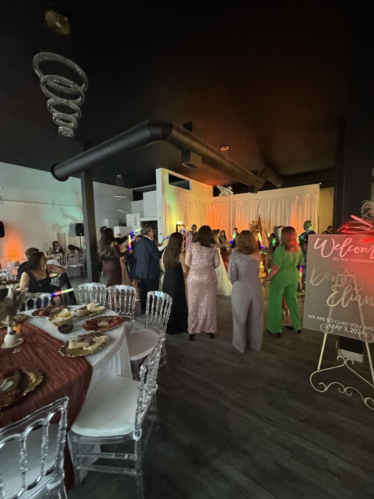 Wedding reception at The Prestige Venue with round tables and floral centerpieces